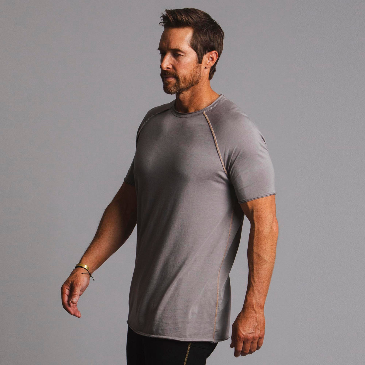 Male modeling tan ultimate tee shirt
