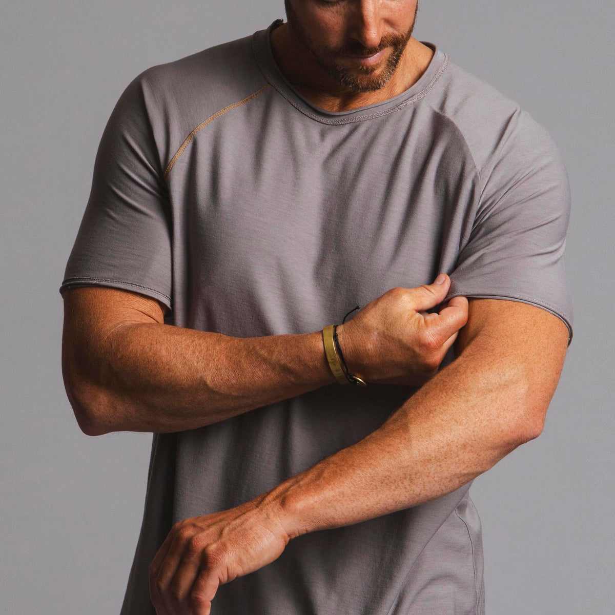 Male modeling tan ultimate tee shirt