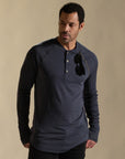 Male modeling blue long sleeve henley