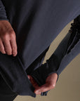 Male modeling blue long sleeve henley