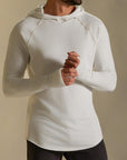 Man modeling white long-sleeve hooded tee