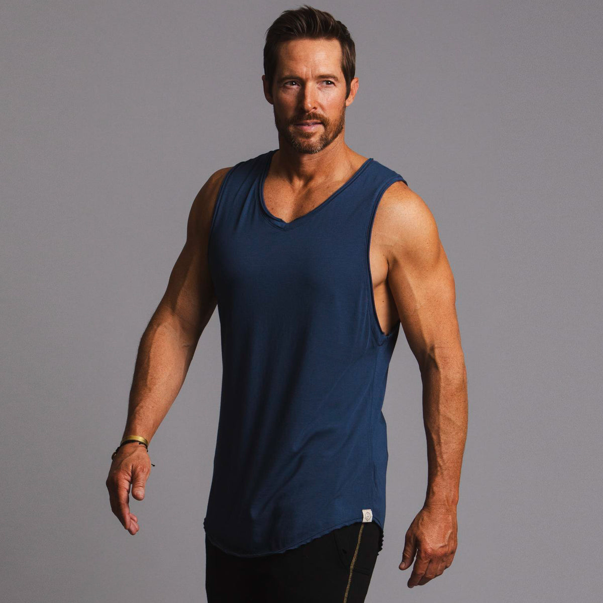 Man modeling a Royal blue tank top