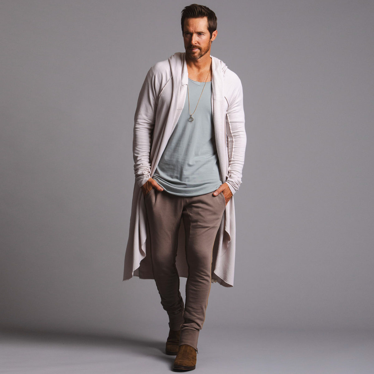 Male modeling white kairos duster
