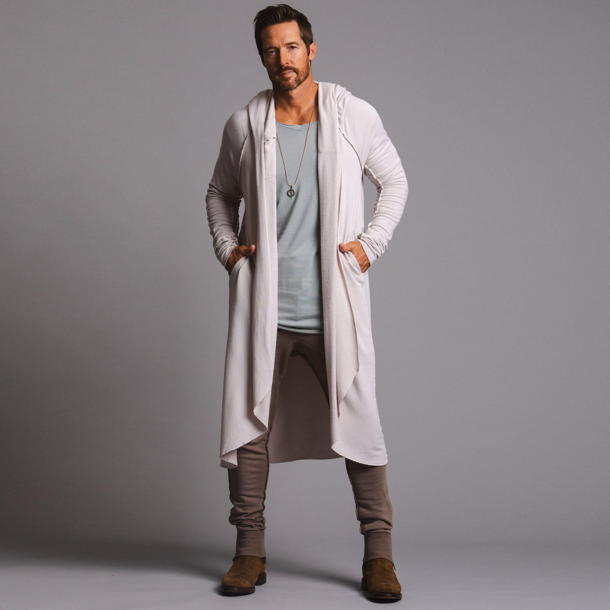 Male modeling white kairos duster
