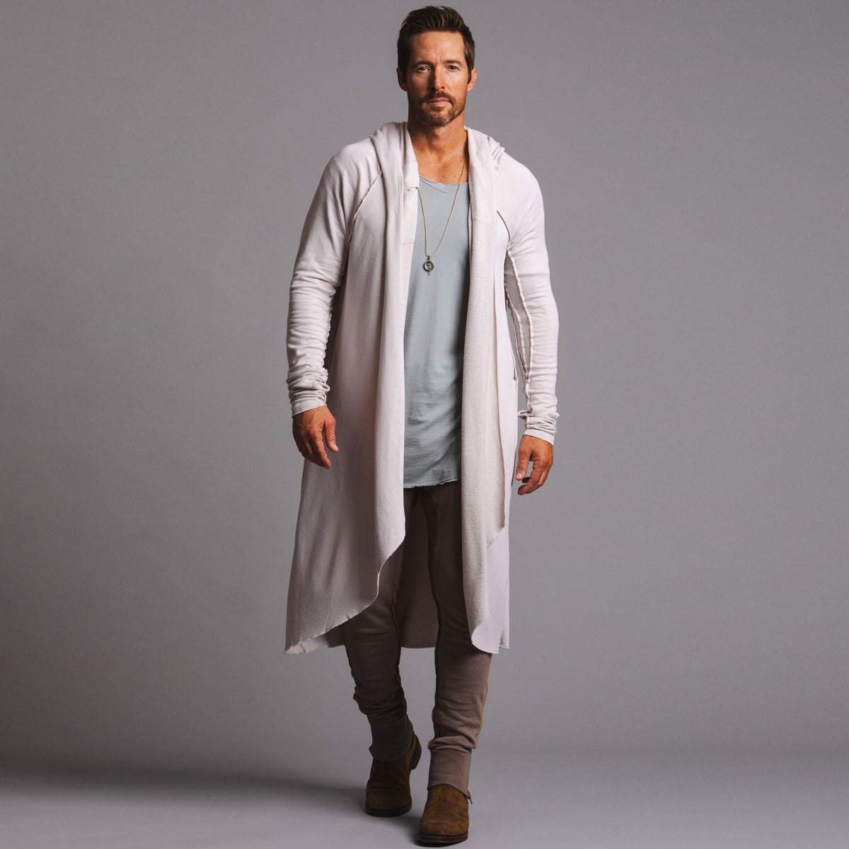 Male modeling white kairos duster