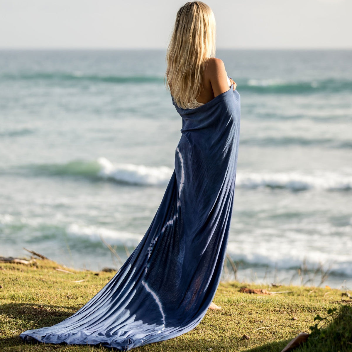 Woman modeling blue tie dye nature wrap