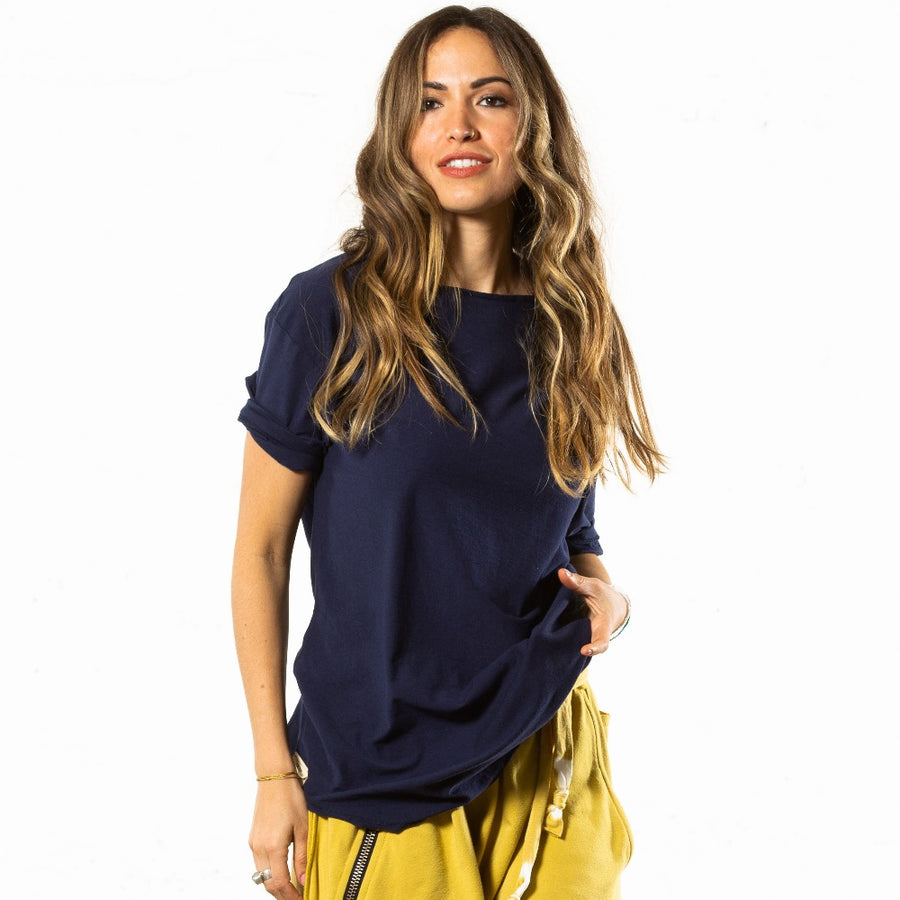 A woman wearing the One Golden Thread New Classic Crew t-shirt in Royal Blue color