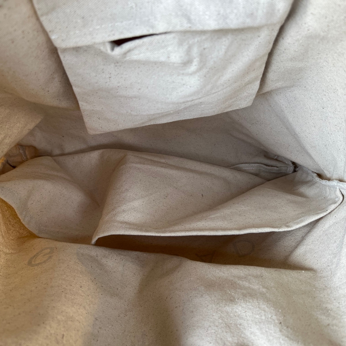 The inside of the Original One Golden Thread Golden Tote Bag 