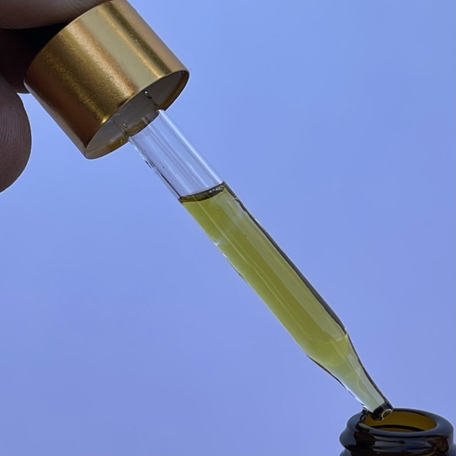 One Golden Thread "7th Sensuous: All Over Essential Oil" blends the fragrances of cardamom, clove, cinnamon & Palo Santo