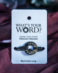 A Customized MyIntent Black Nickel Plated Black Twist Bracelet with the words "Inner Power"
