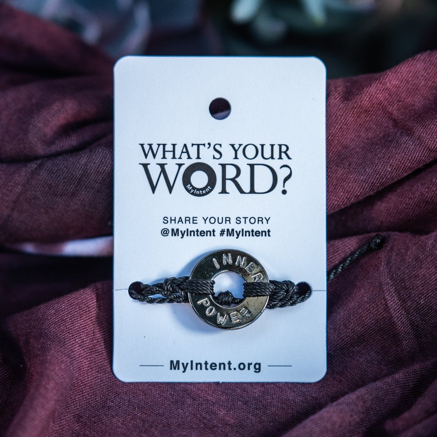 A Customized MyIntent Black Nickel Plated Black Twist Bracelet with the words "Inner Power"
