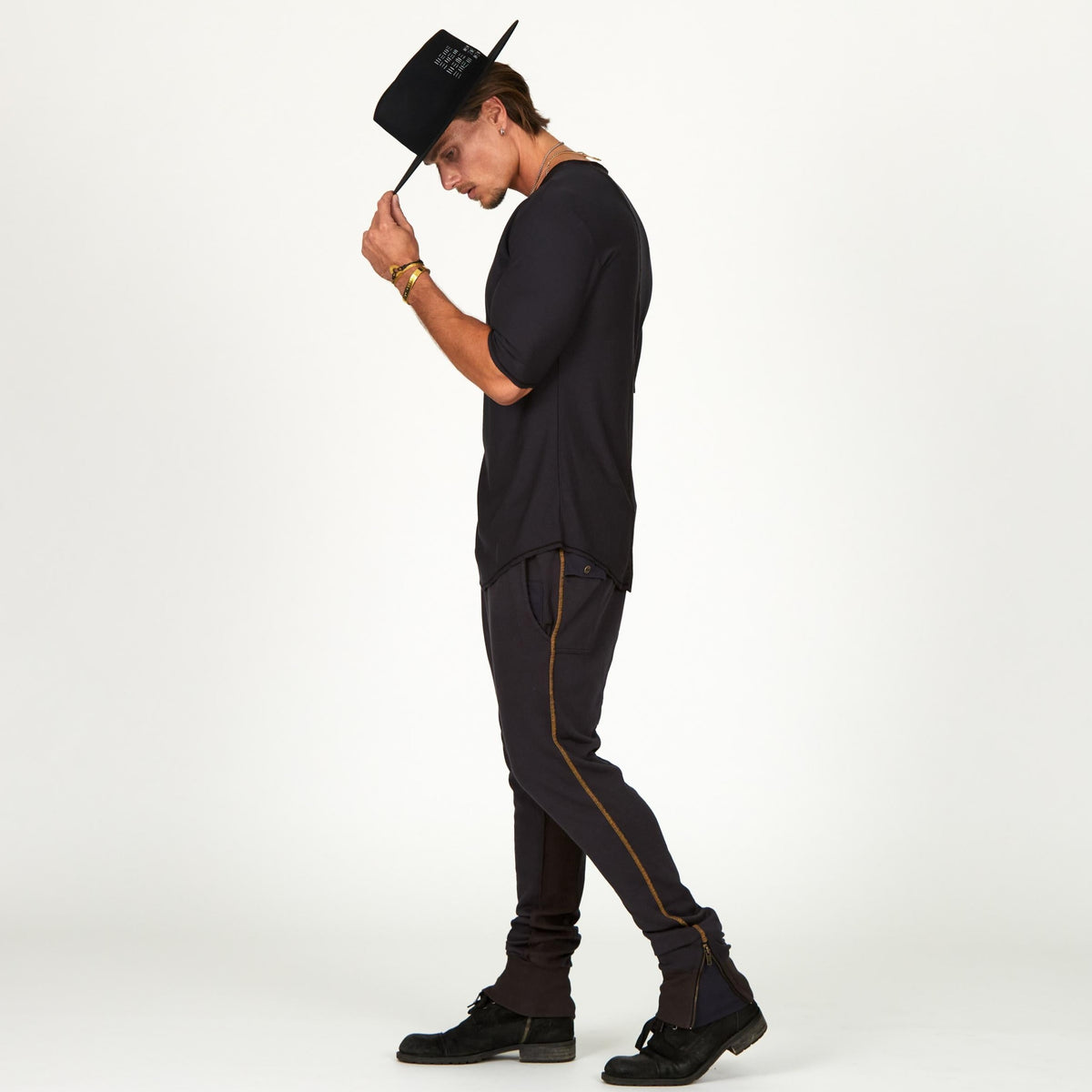 Man modeling a milano pants in charcoal blue