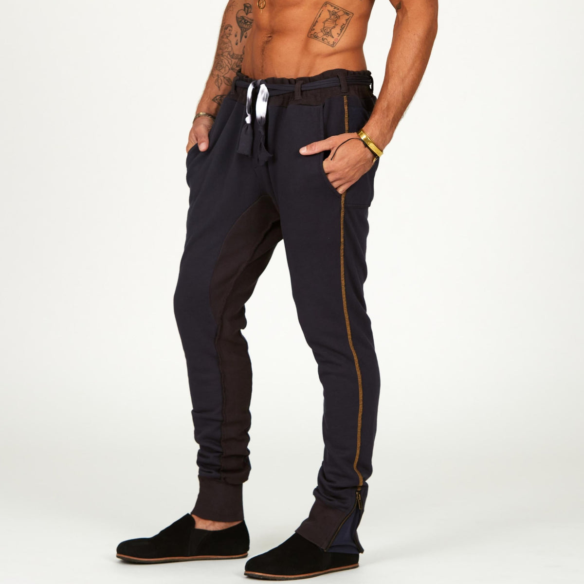 Man modeling a milano pants in charcoal blue