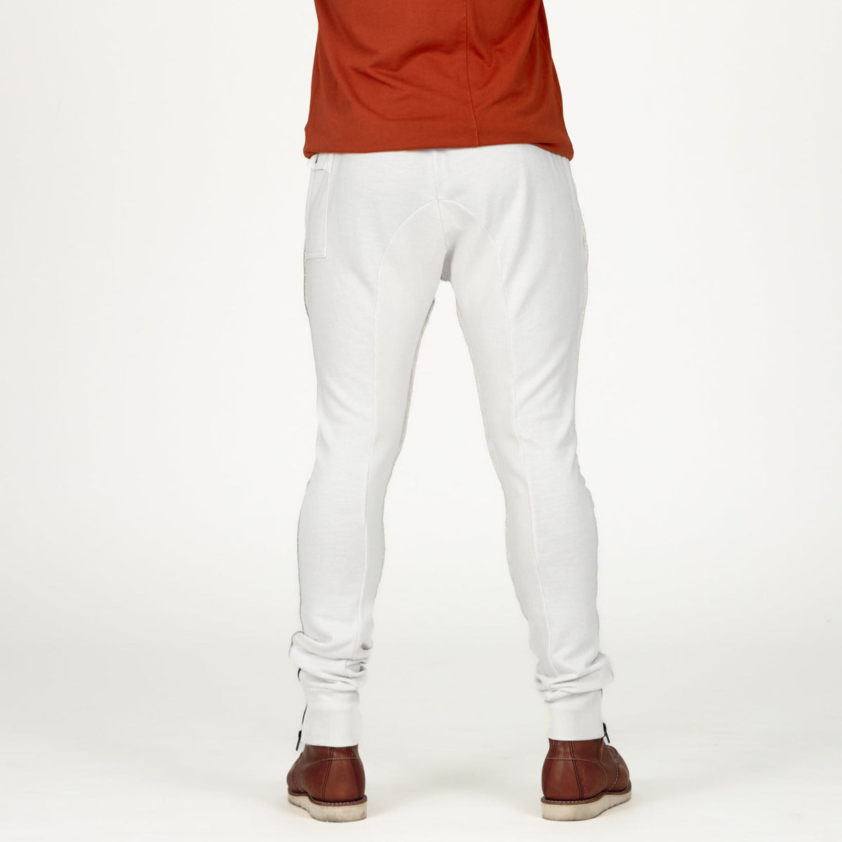 Man modeling the milano pant in pure white
