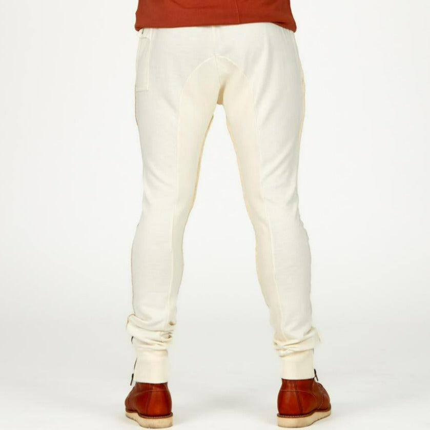 Man modeling the milano pant in white stone