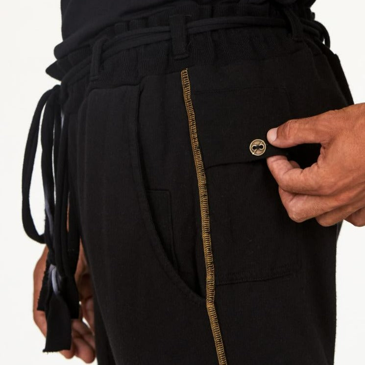 Man modeling the milano pant in black