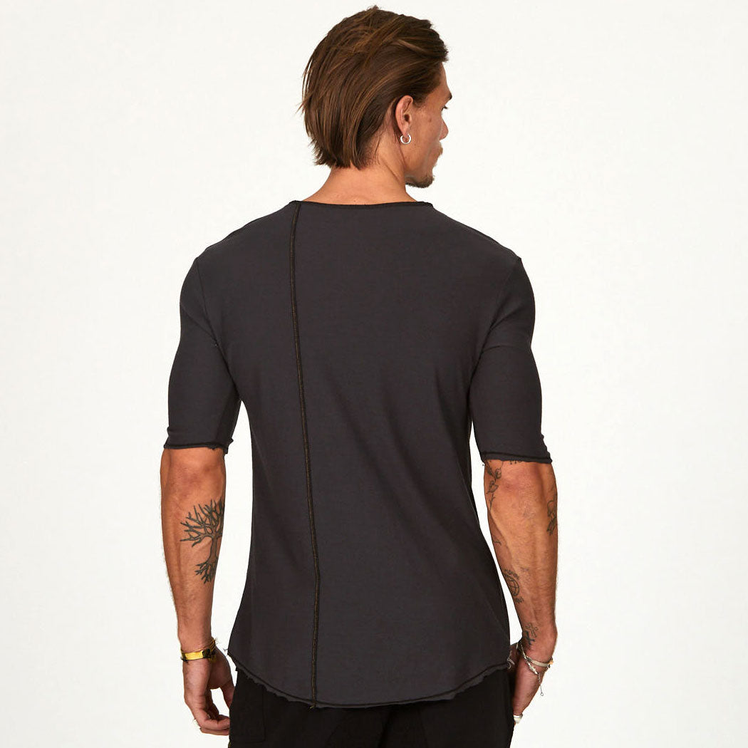 Male modeling black crew neck shirt
