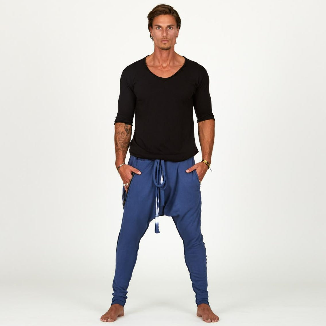Male modeling Indigo Dawn blue colored pants