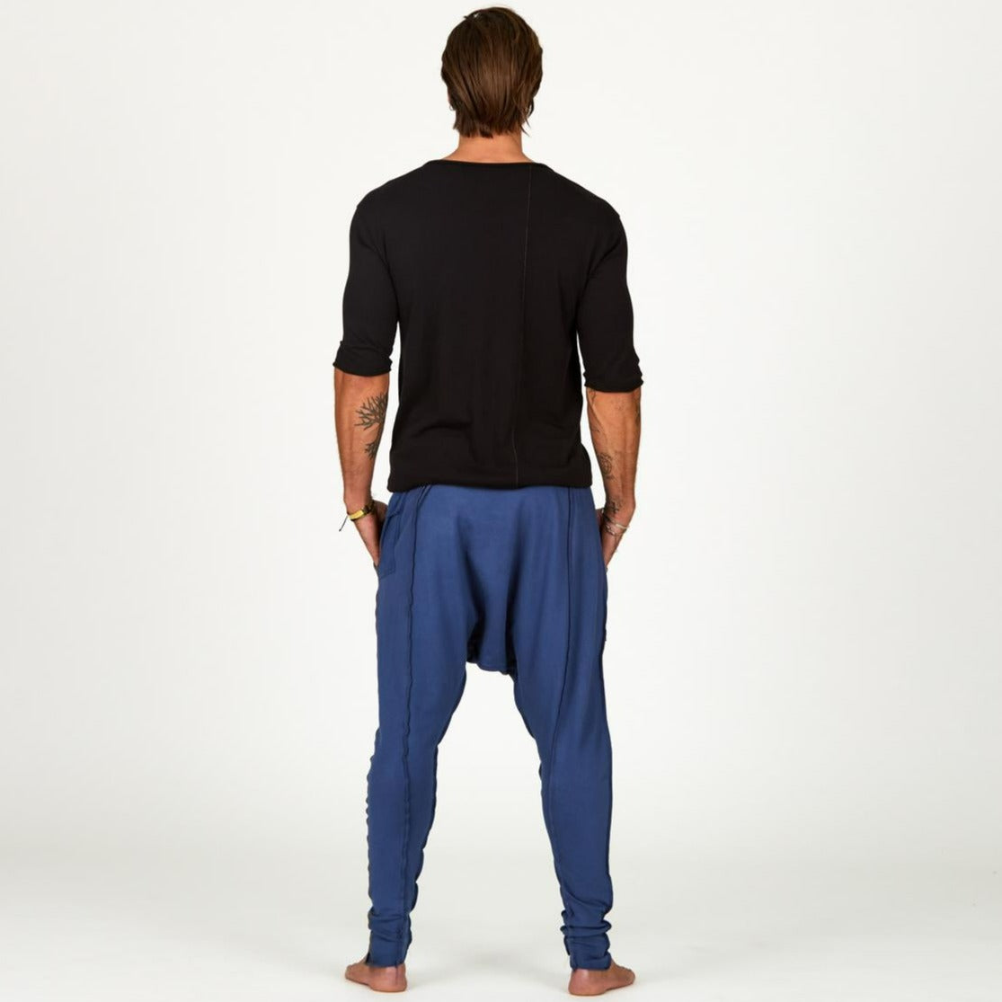 Male modeling Indigo Dawn blue colored pants