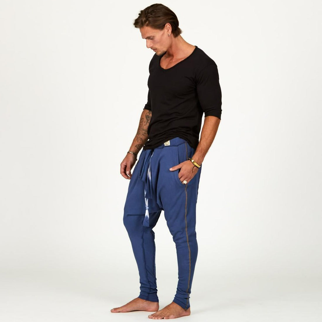 Male modeling Indigo Dawn blue colored pants