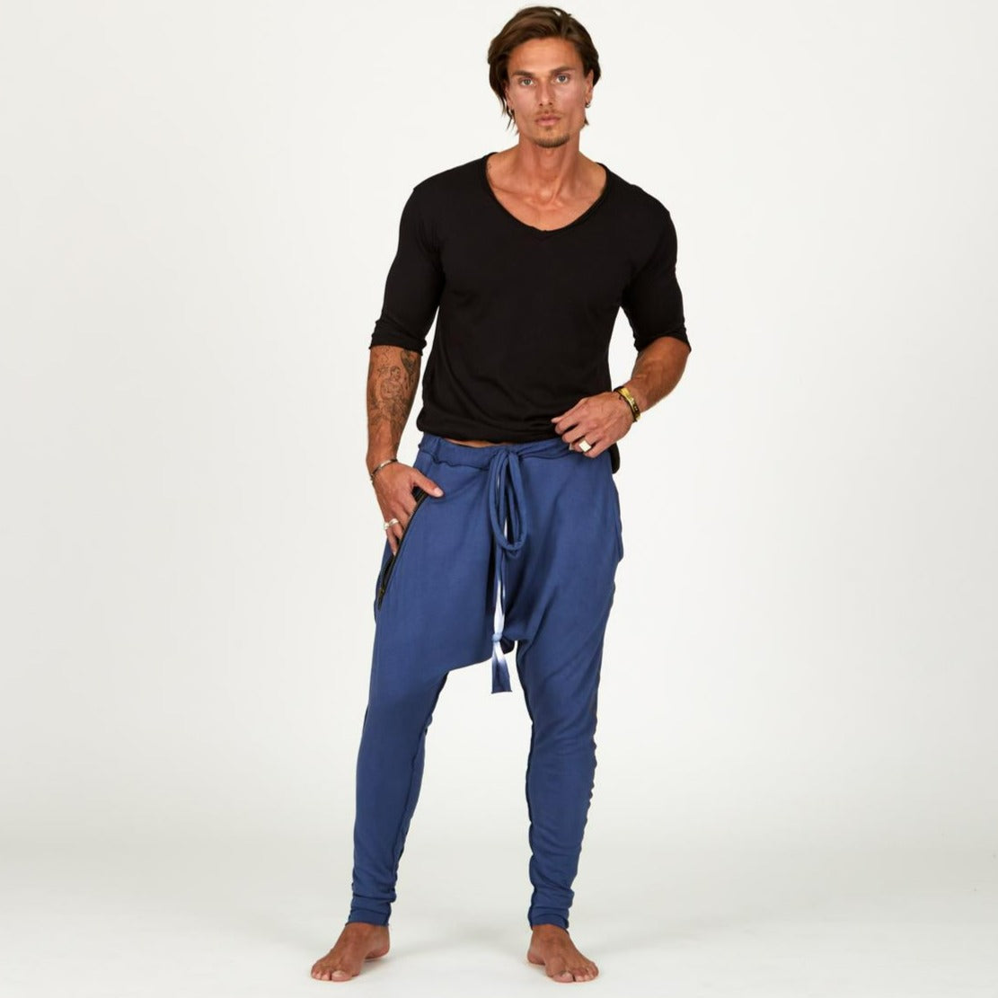 Male modeling Indigo Dawn blue colored pants