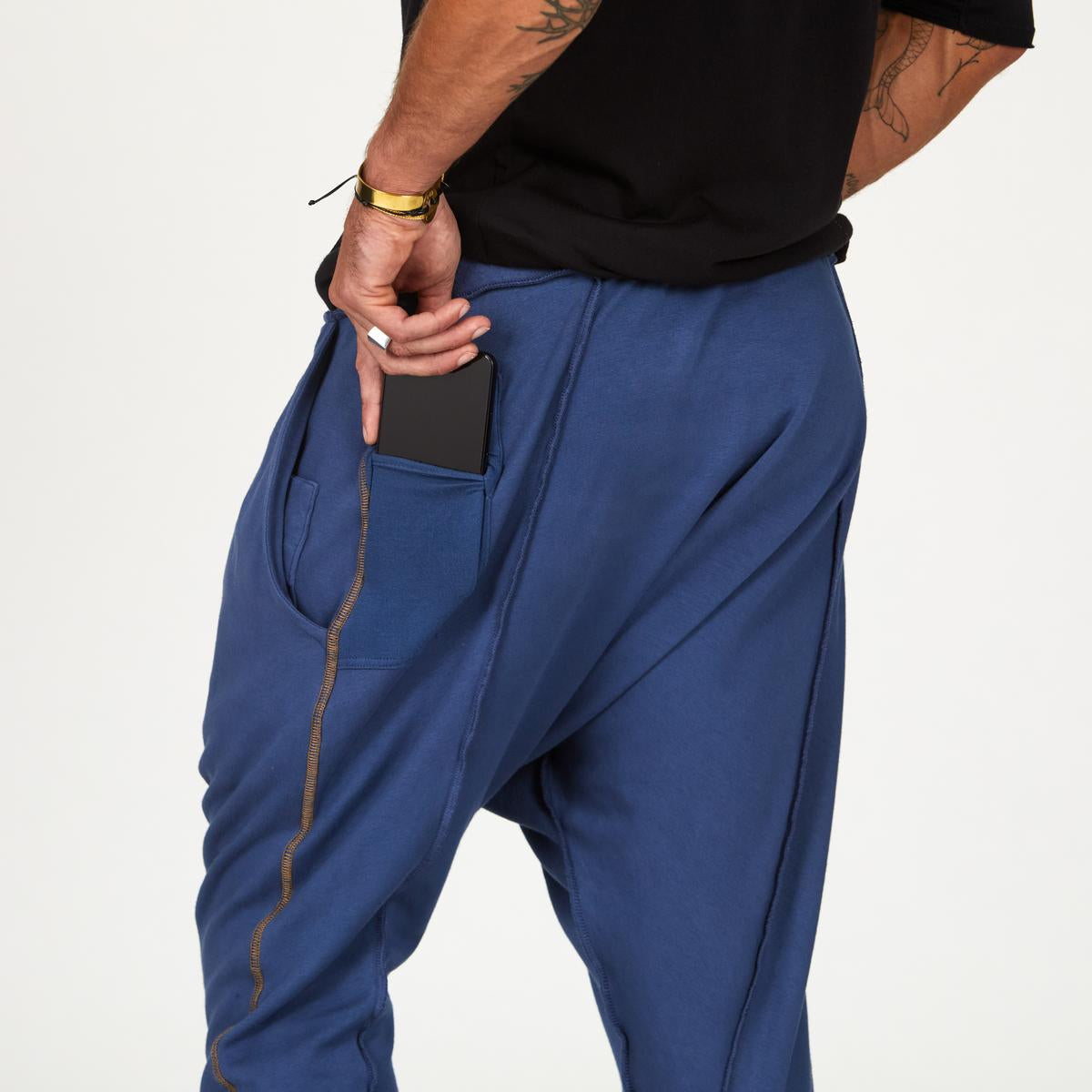 Male modeling Indigo Dawn blue colored pants