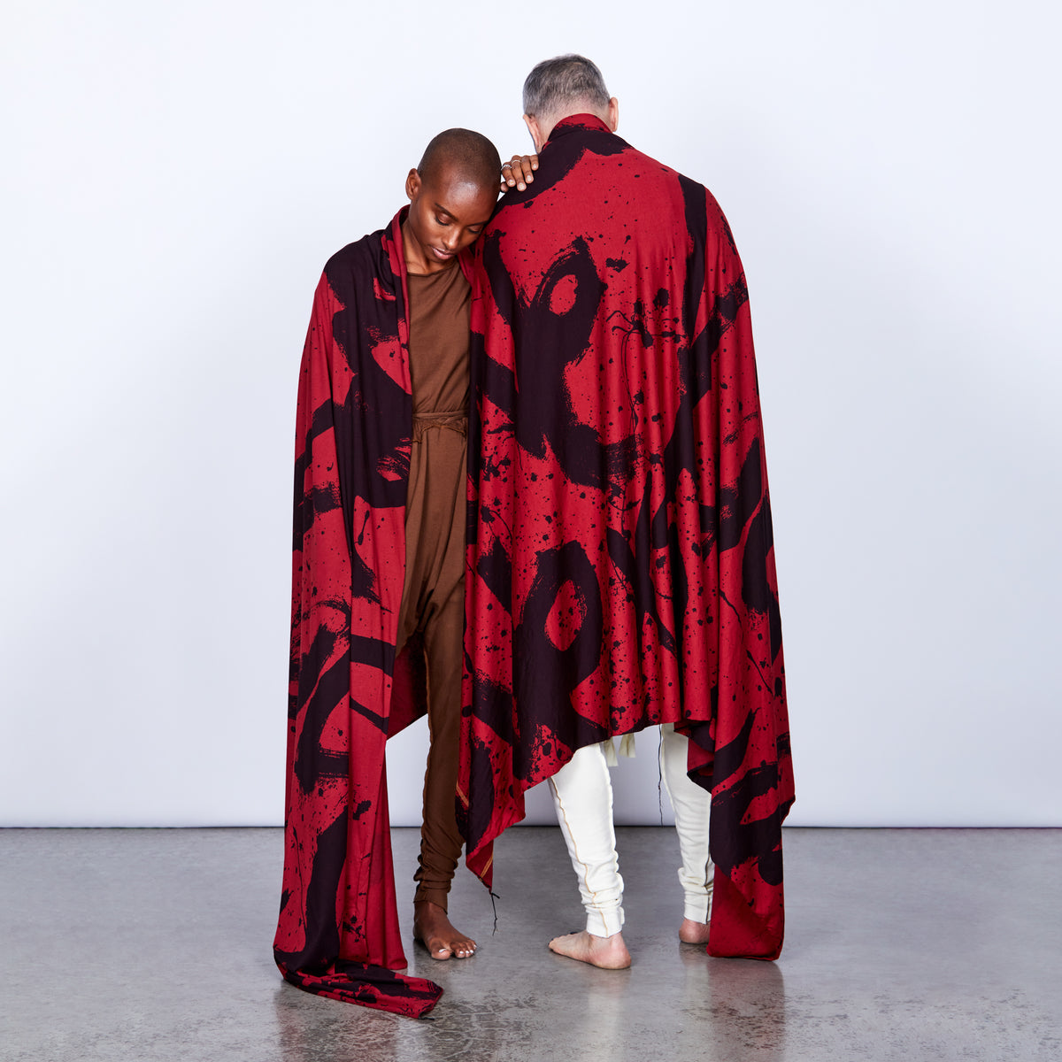 Couple modeling red Ruben LOVE nature wrap