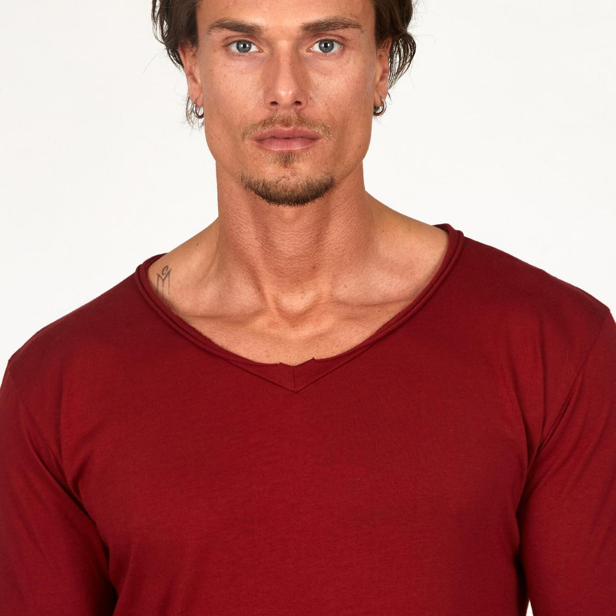 Male modeling a Merlot Red V Neck Tree Shirt
