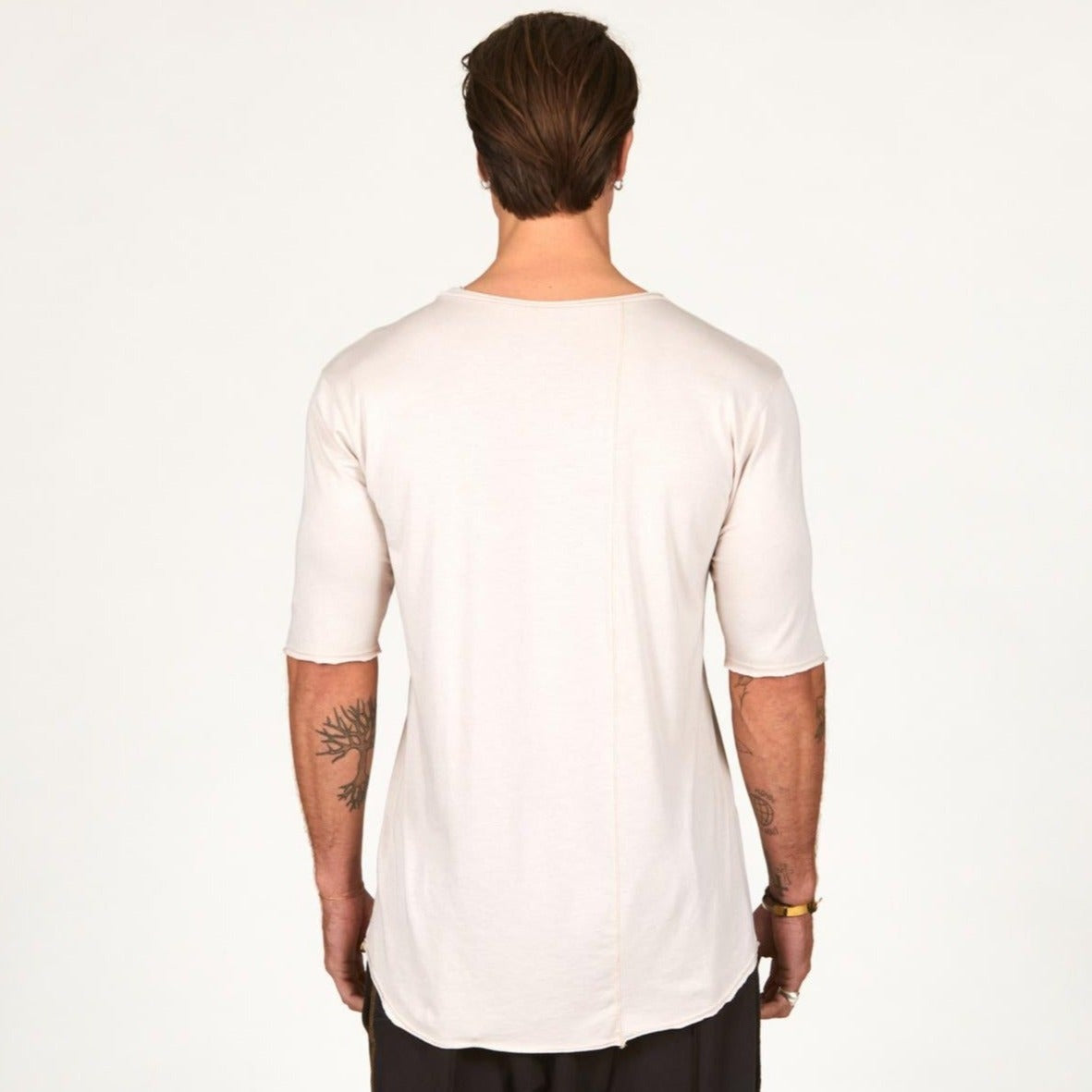 Man modeling a long sleeve shirt in white
