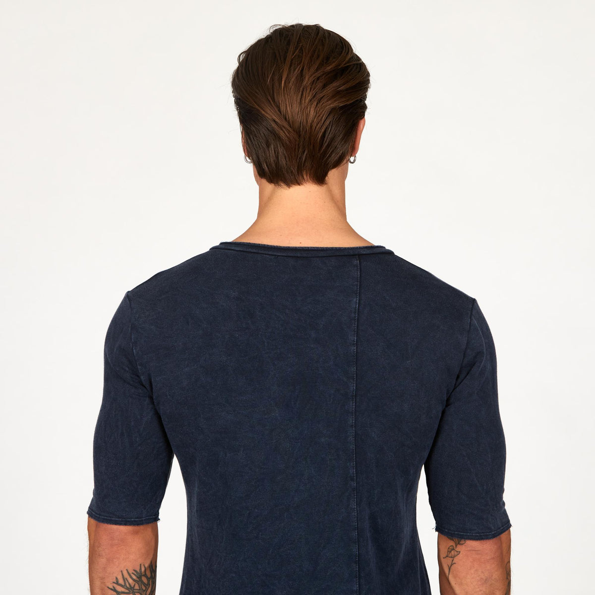 A man wearing the One Golden Thread Fleece Sweater v neck shirt in   blue mineral color