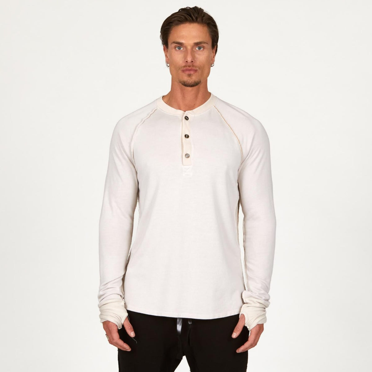 male modeling white long sleeve shirt