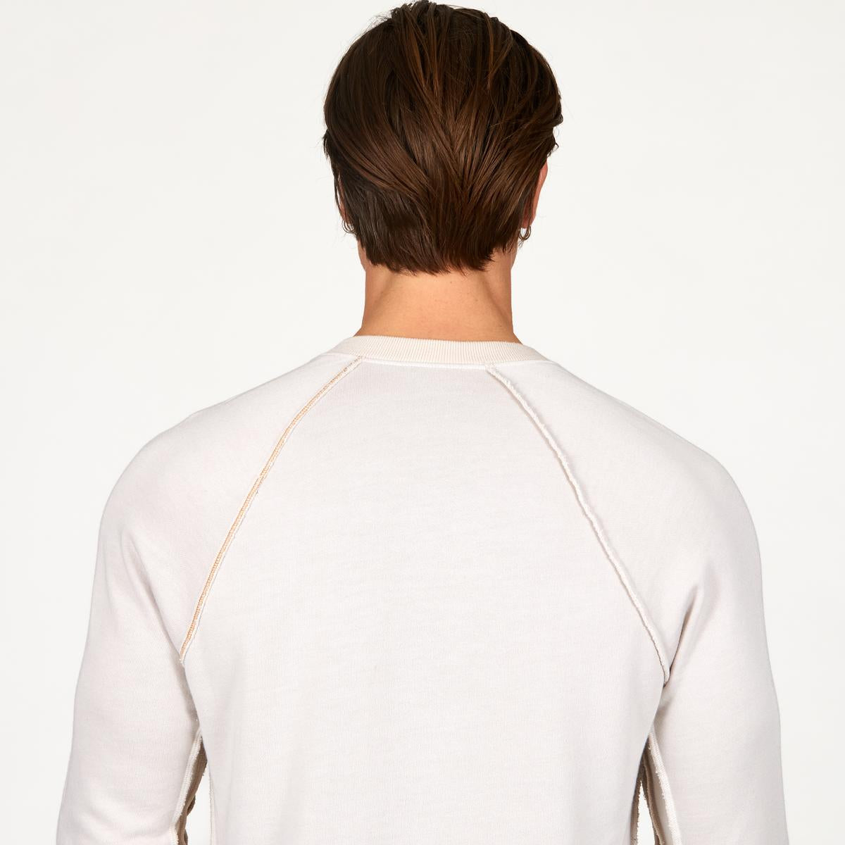 male modeling white long sleeve shirt