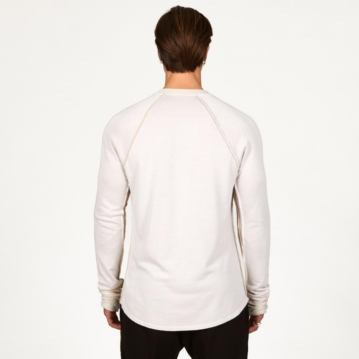 male modeling white long sleeve shirt