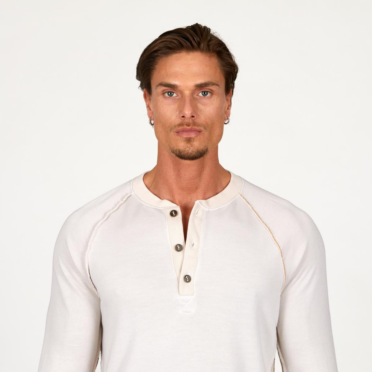 male modeling white long sleeve shirt