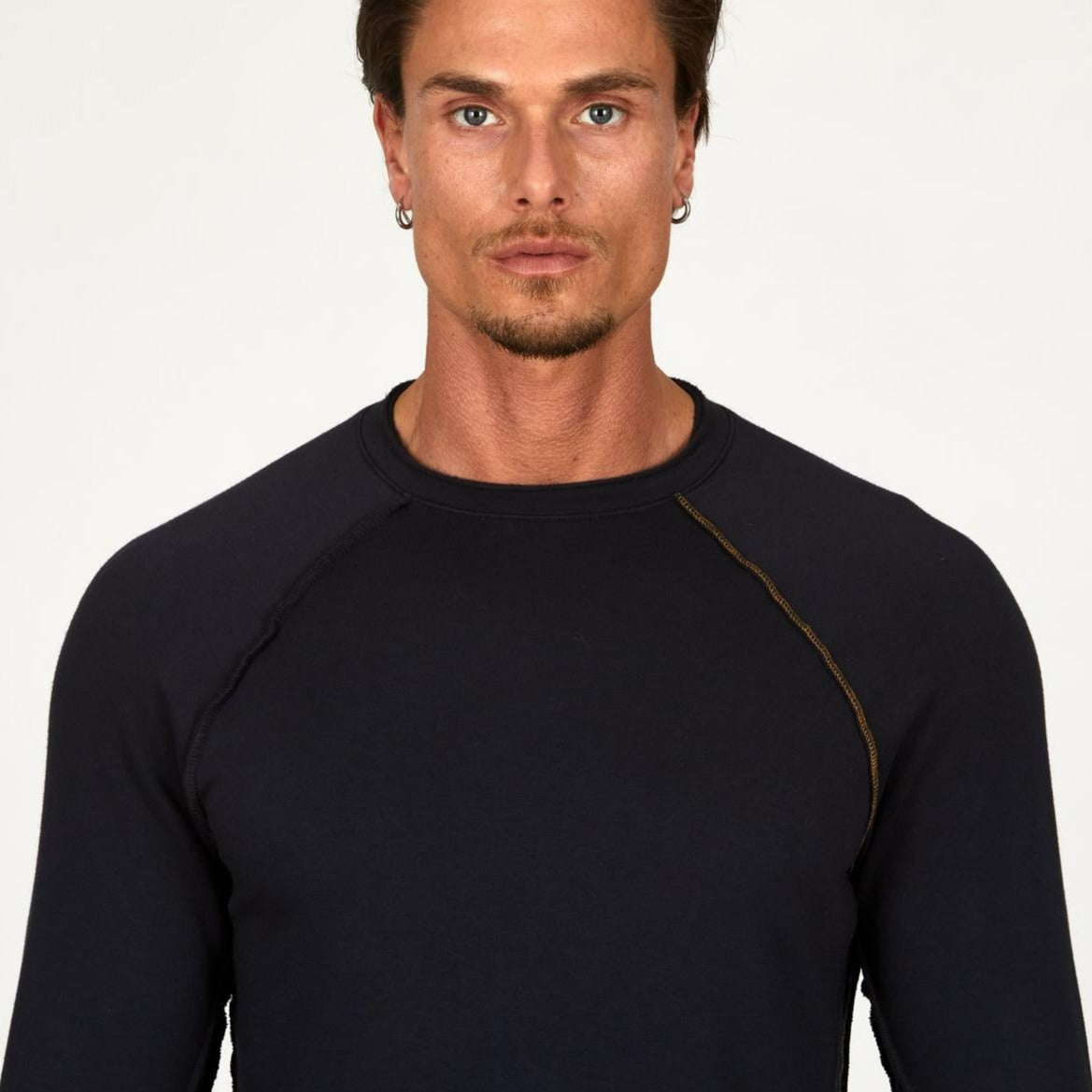 Male modeling black long sleeve raglan