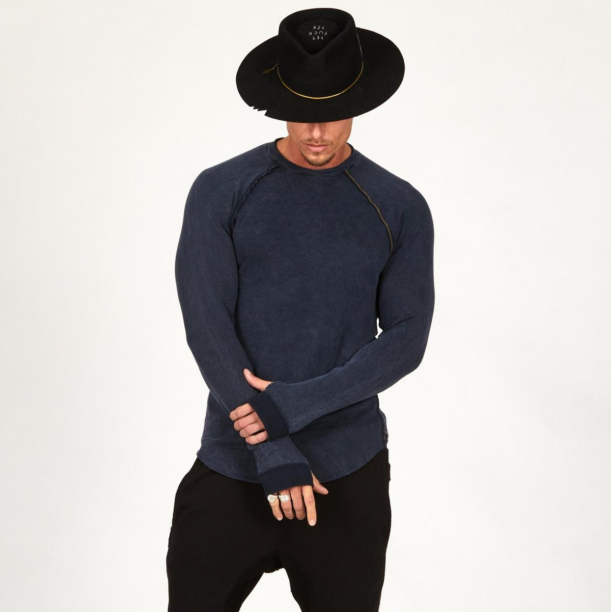 Male modeling dark blue long sleeve raglan