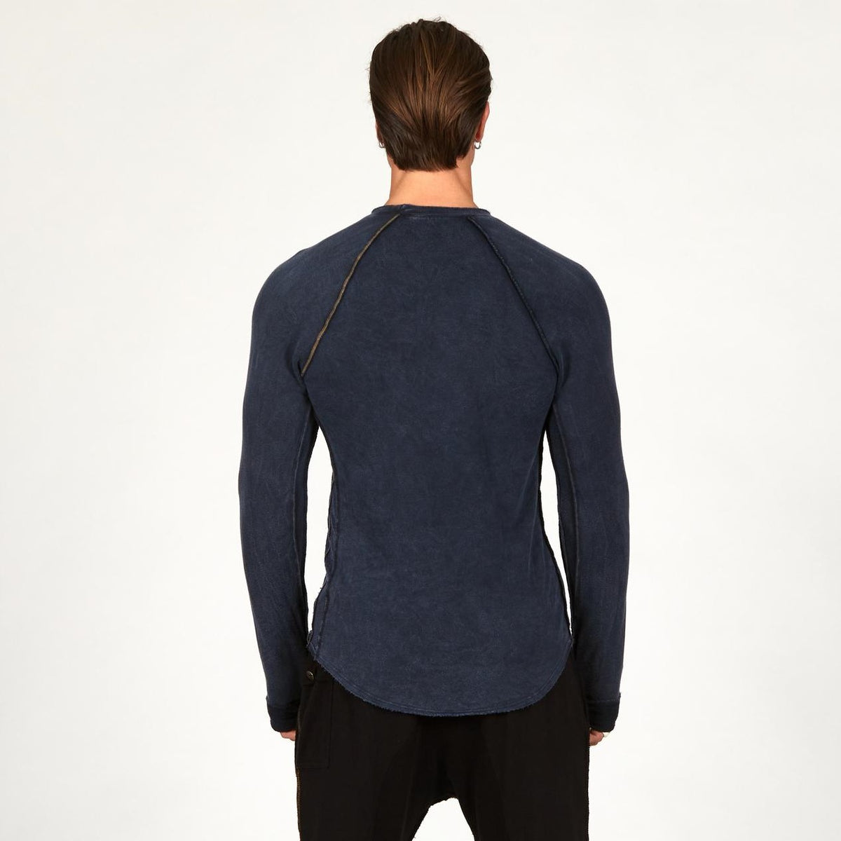 Male modeling dark blue long sleeve raglan