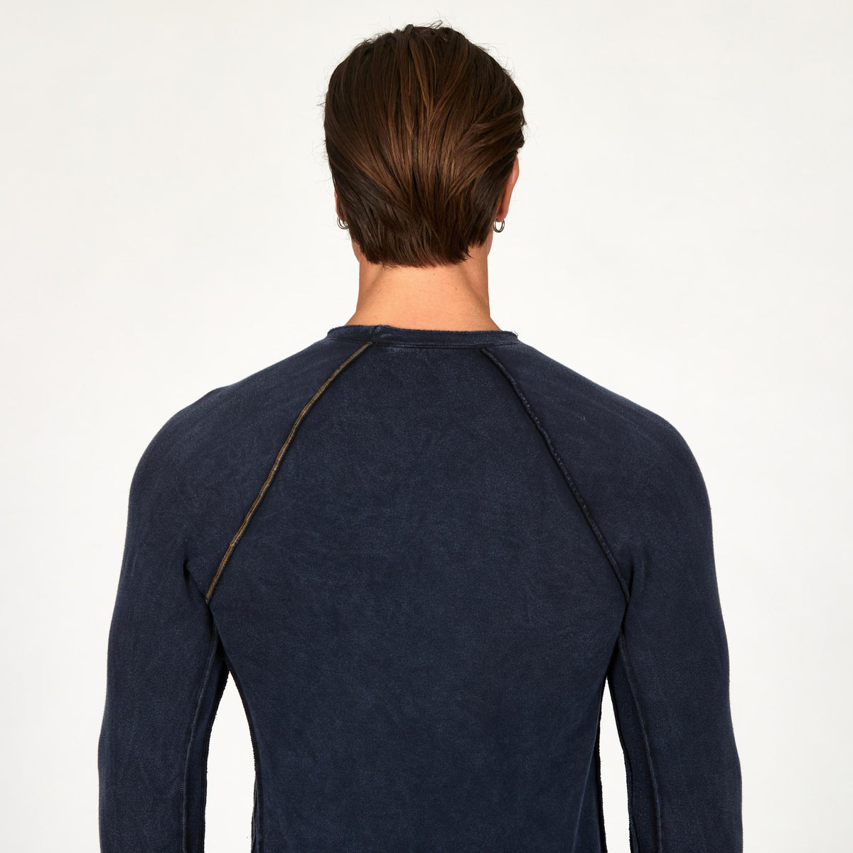 Male modeling dark blue long sleeve raglan