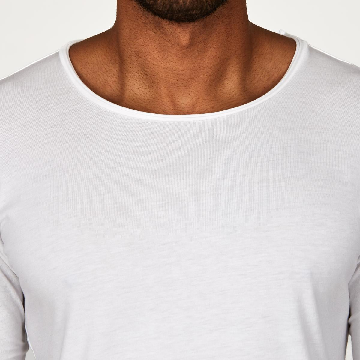 Male modeling white crew neck shirt