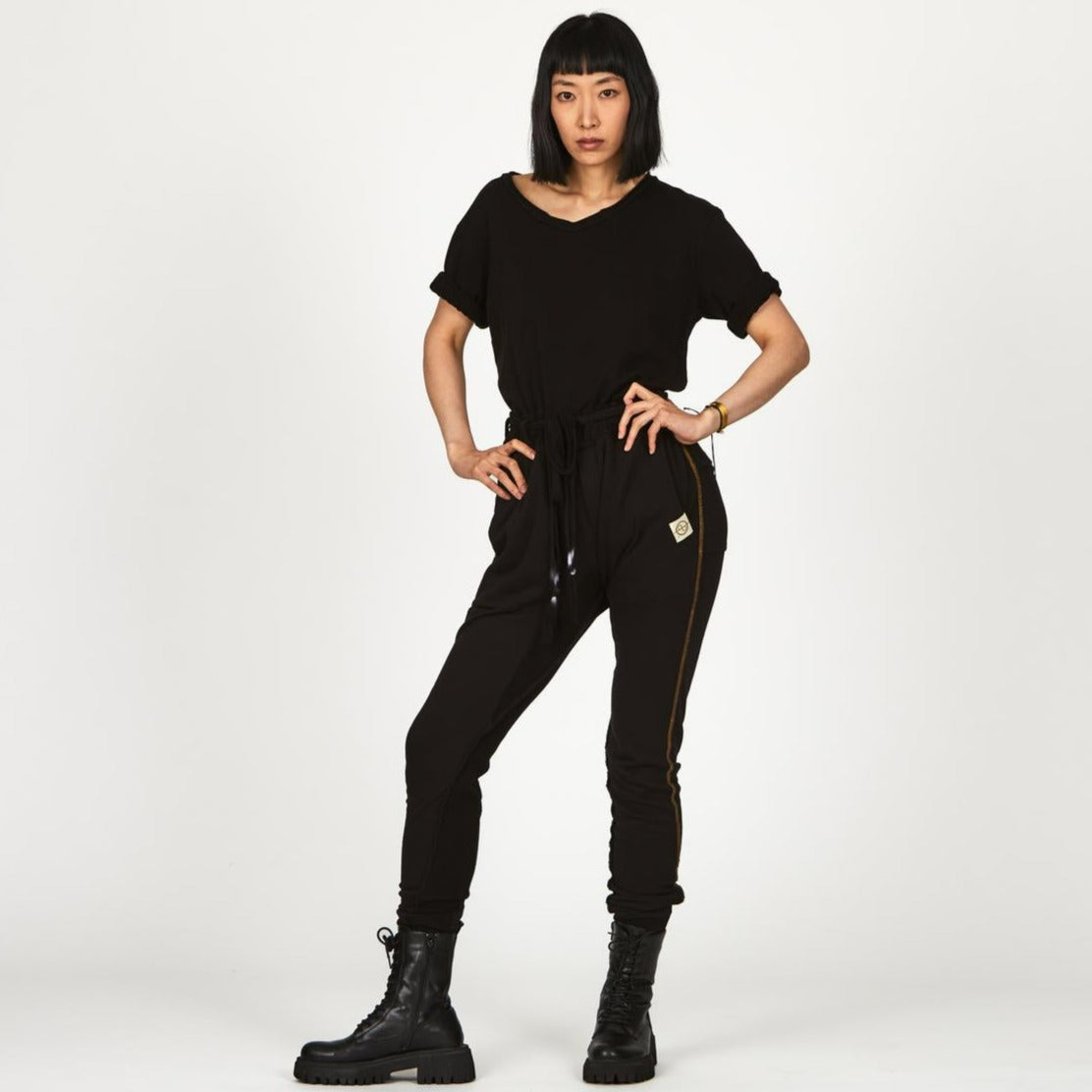 Woman modeling the milano pant in black