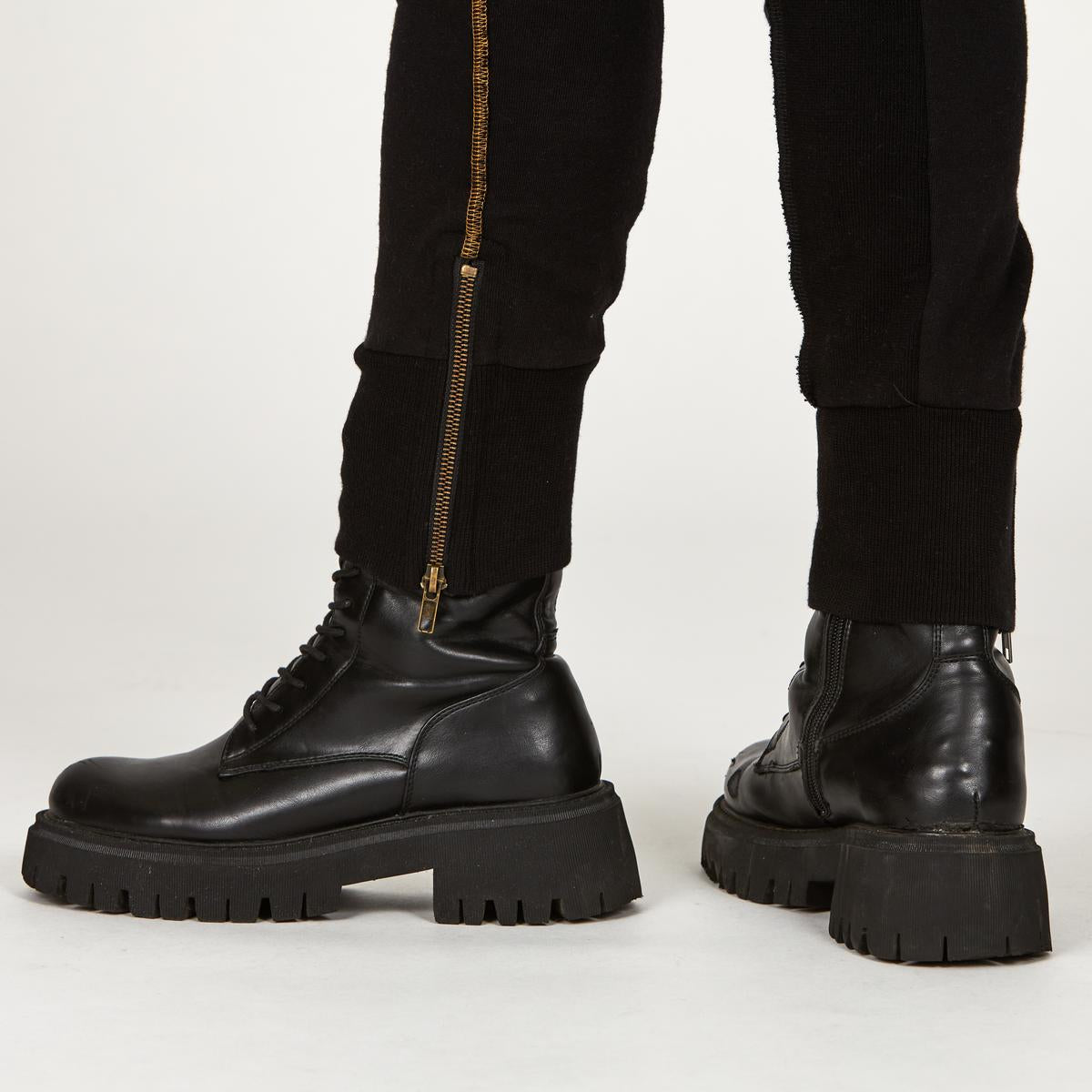 Man modeling the milano pant in black