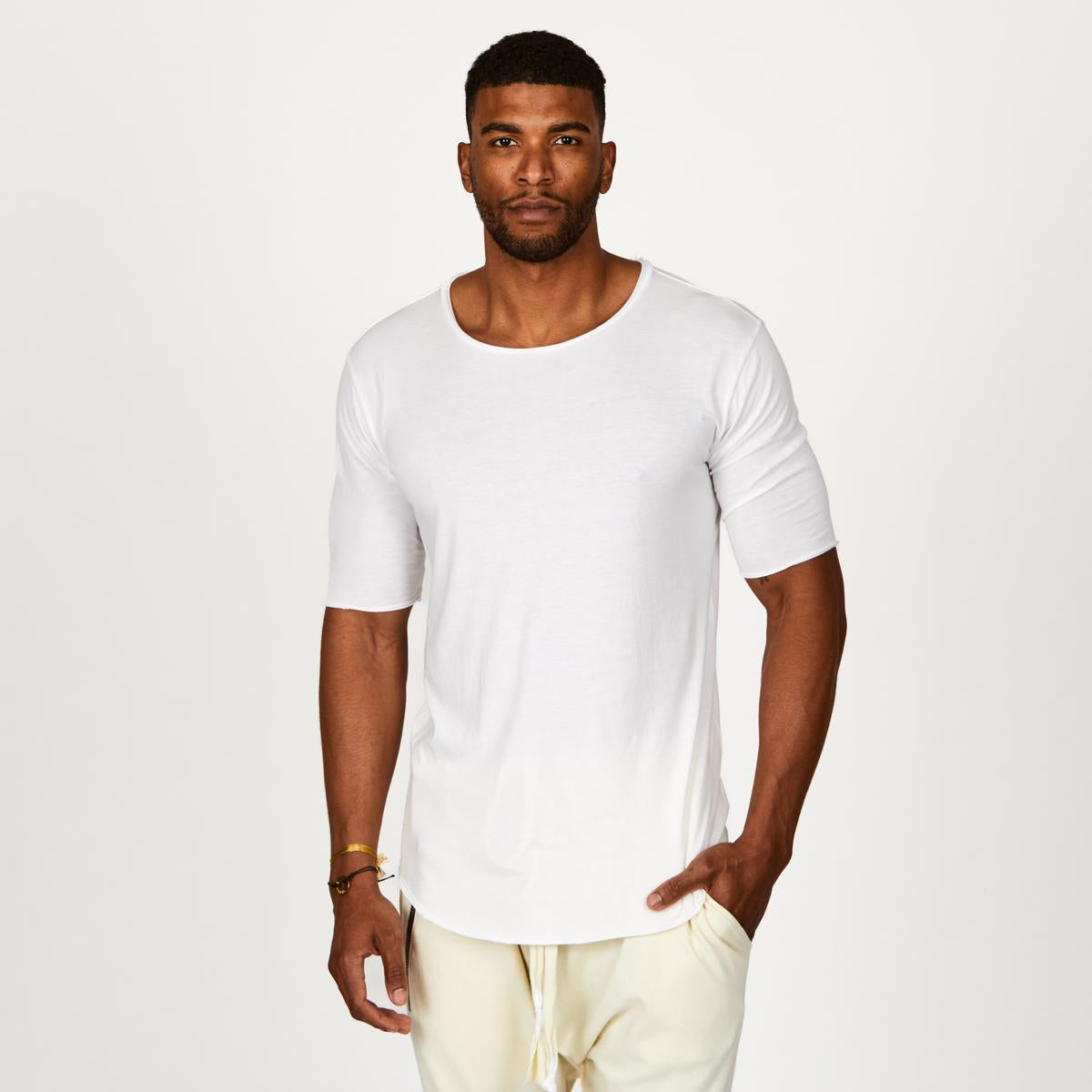 Male modeling white crew neck shirt