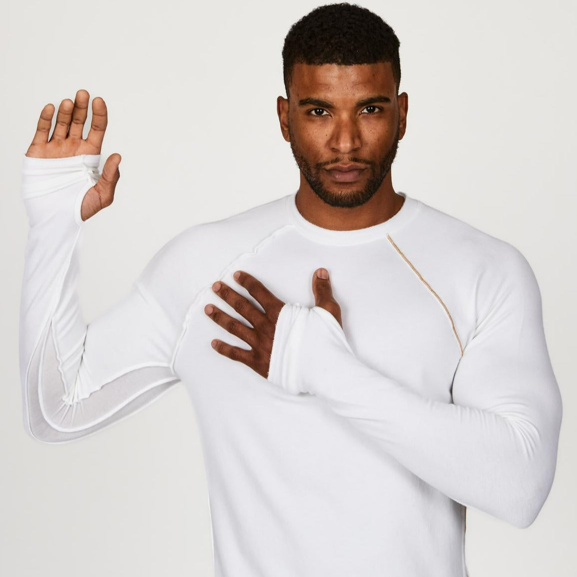 Male modeling white long sleeve raglan