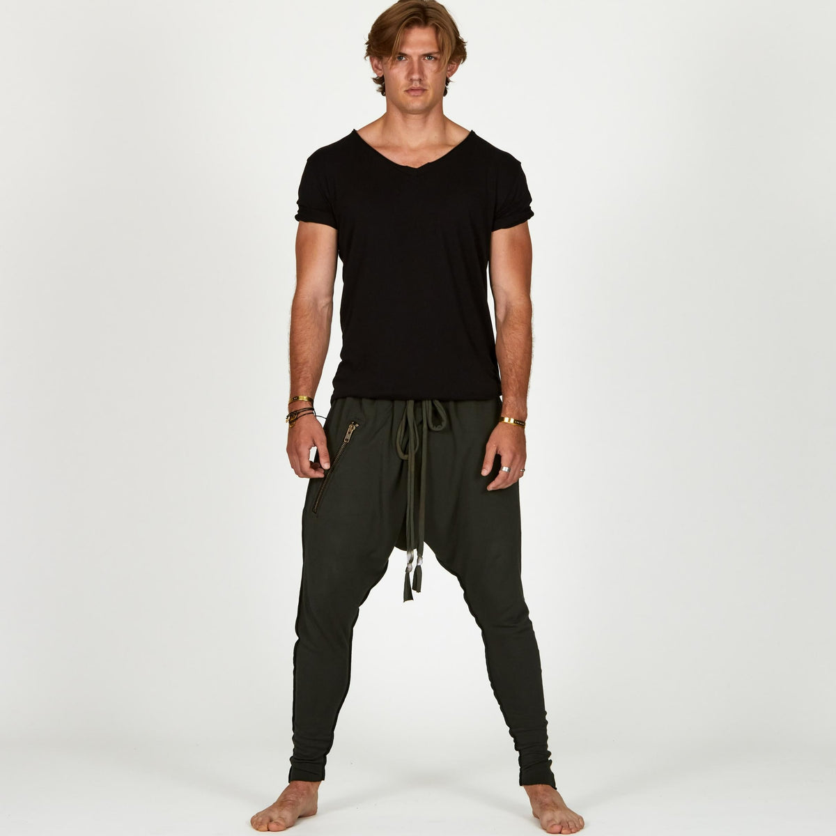 Male modeling Urban Forest green colored pants