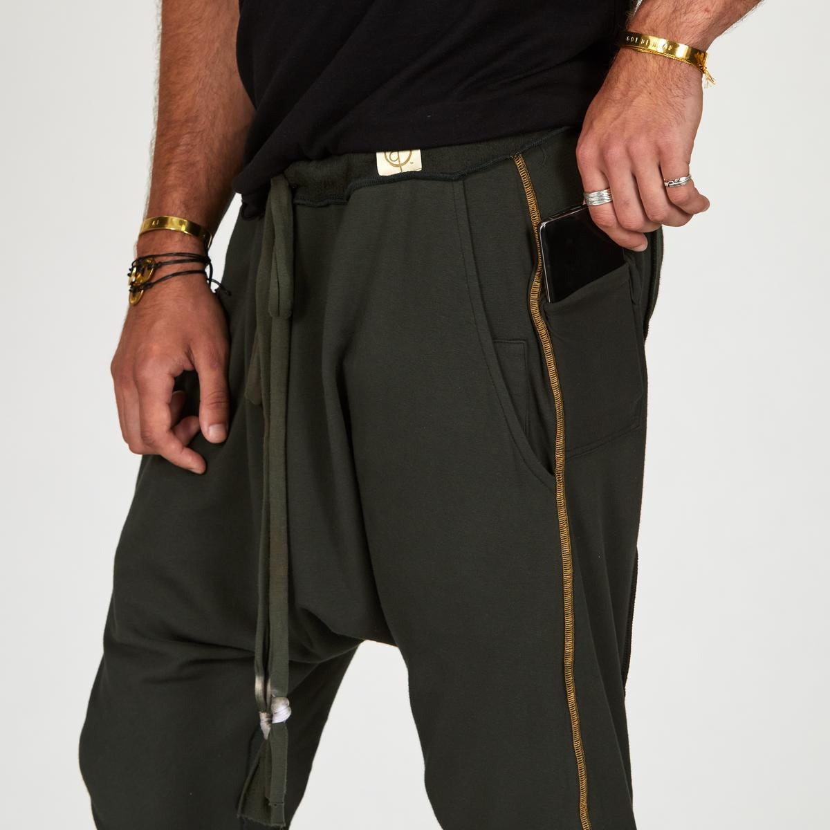 Male modeling Urban Forest green colored pants