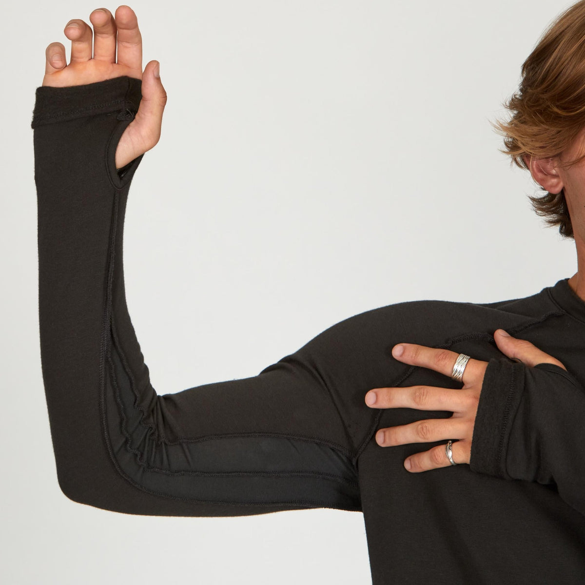 Male modeling dark long sleeve raglan
