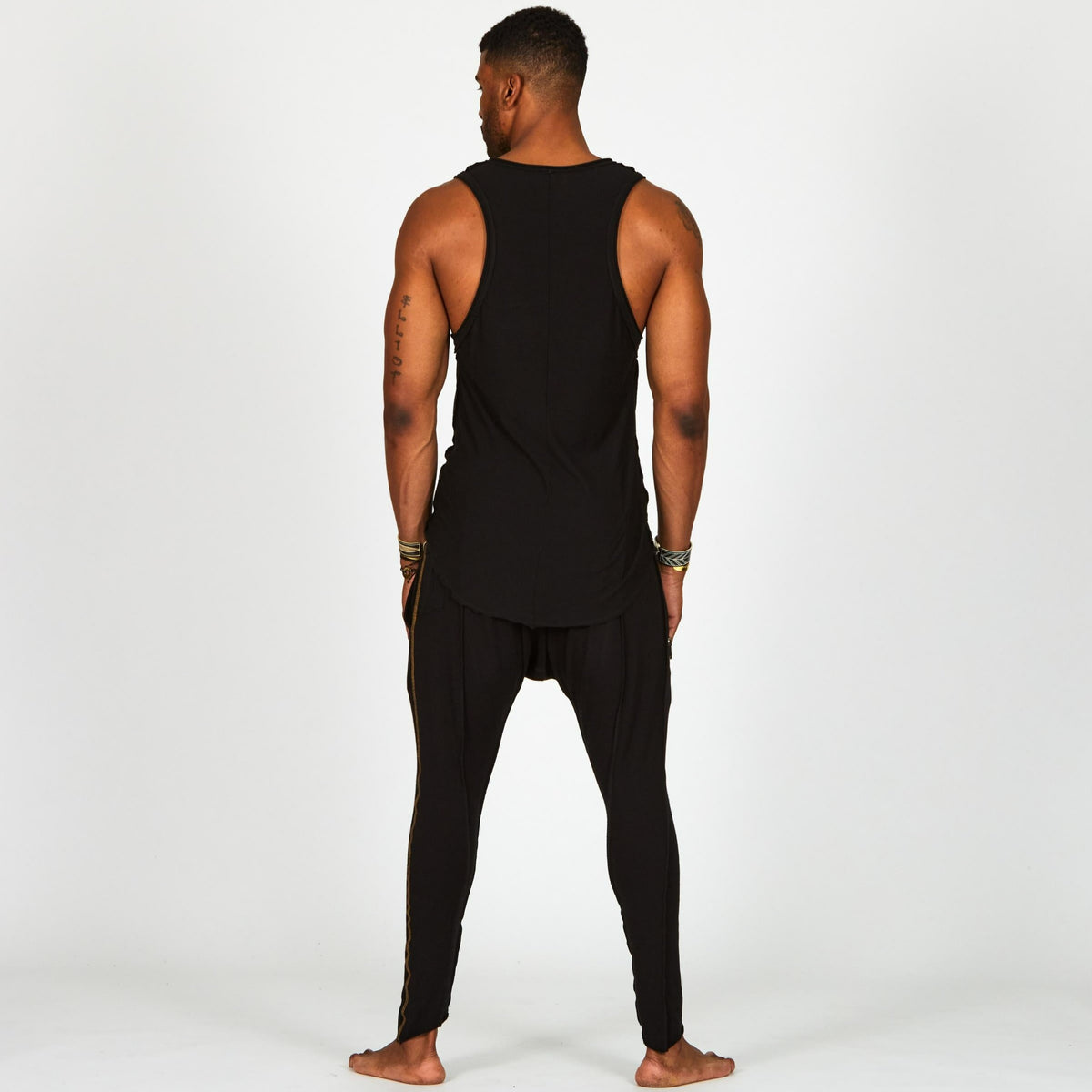 Male modeling Black Onyx colored pants
