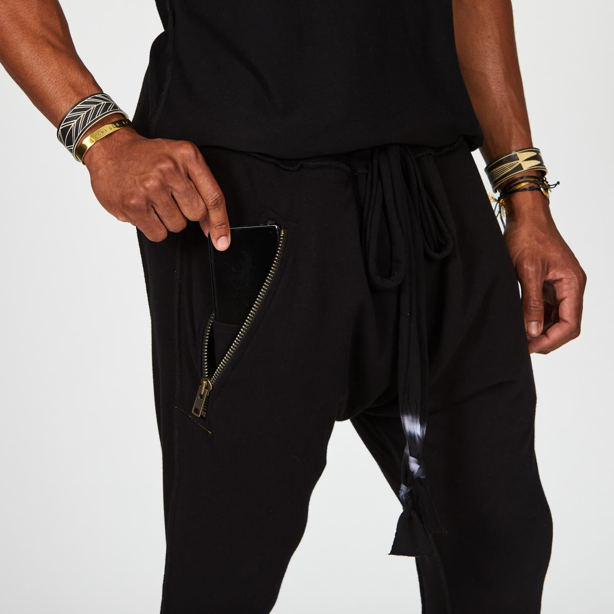 Male modeling Black Onyx colored pants