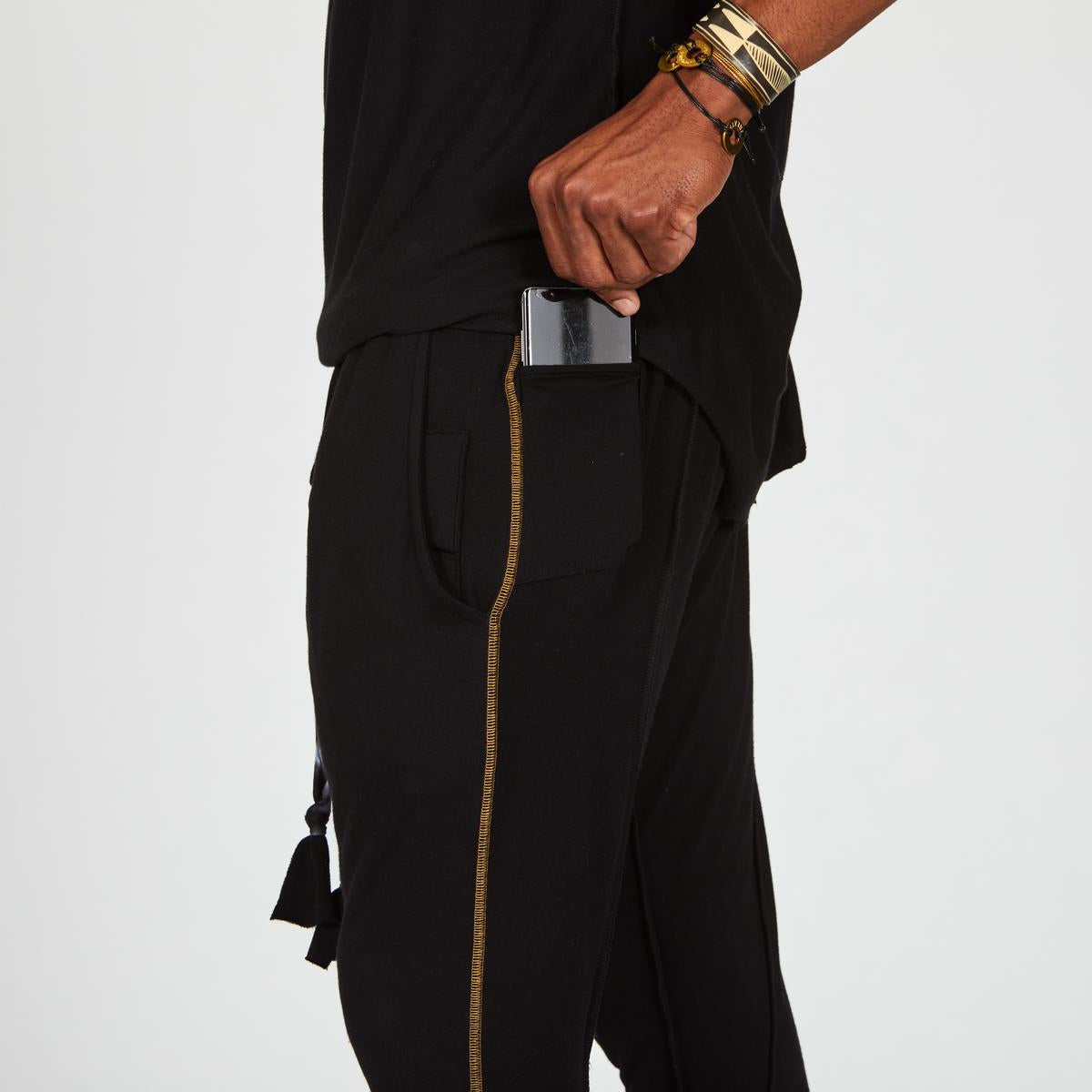 Male modeling Black Onyx colored pants