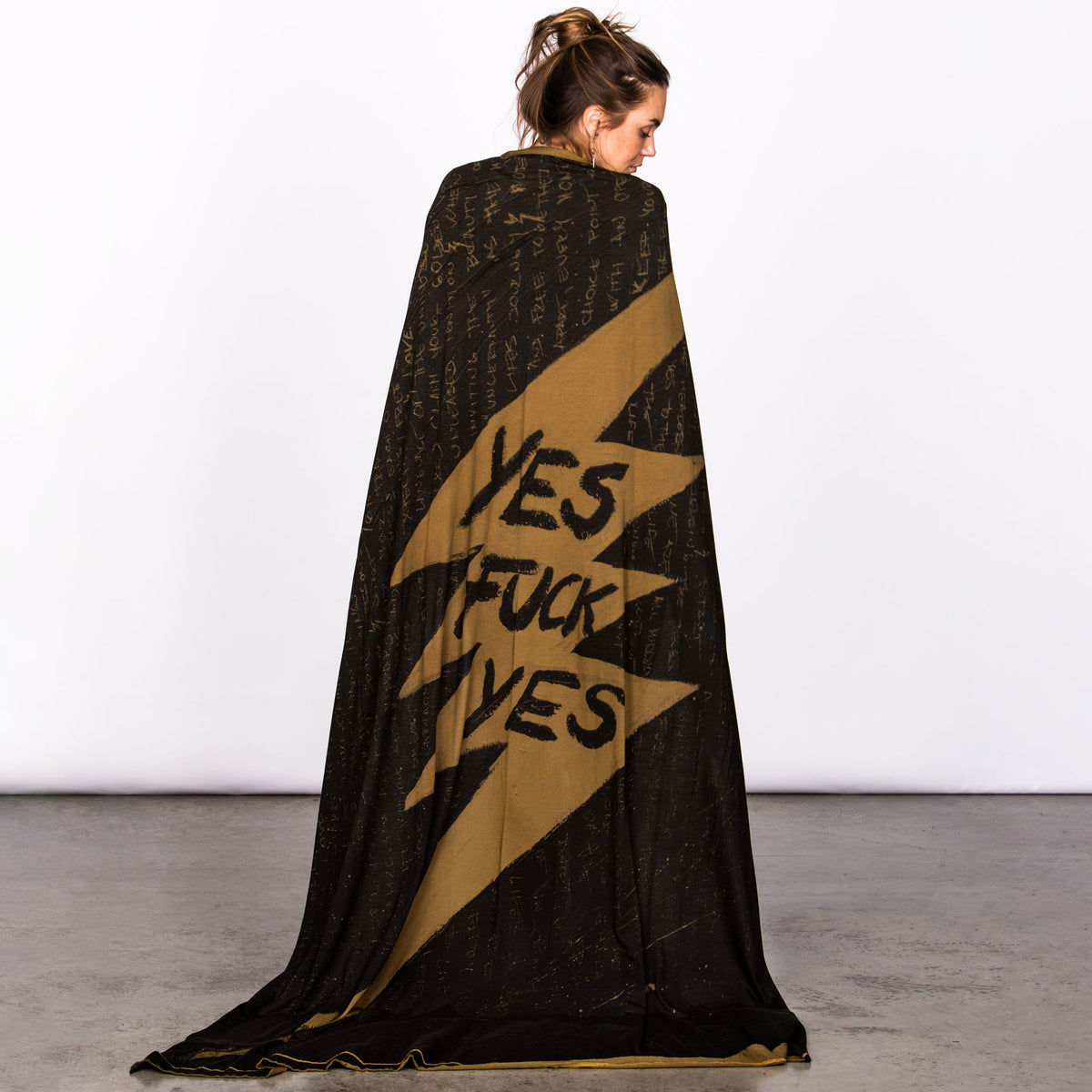 Woman modeling gold Benzova nature wrap